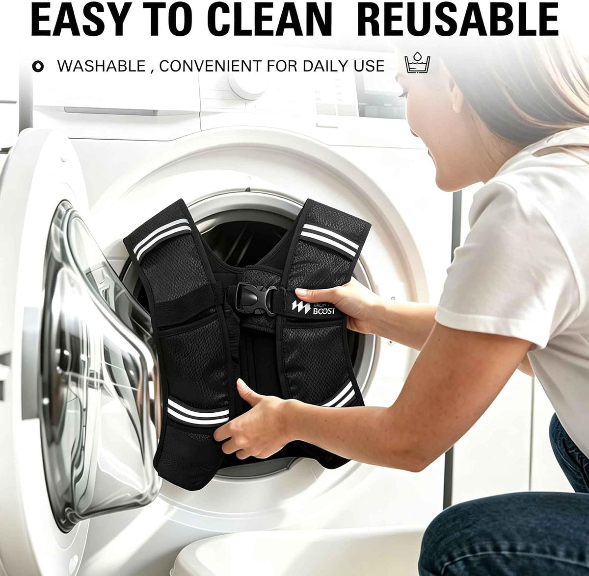 Black washable adjustable weighted vest being cleaned, with adjustable straps